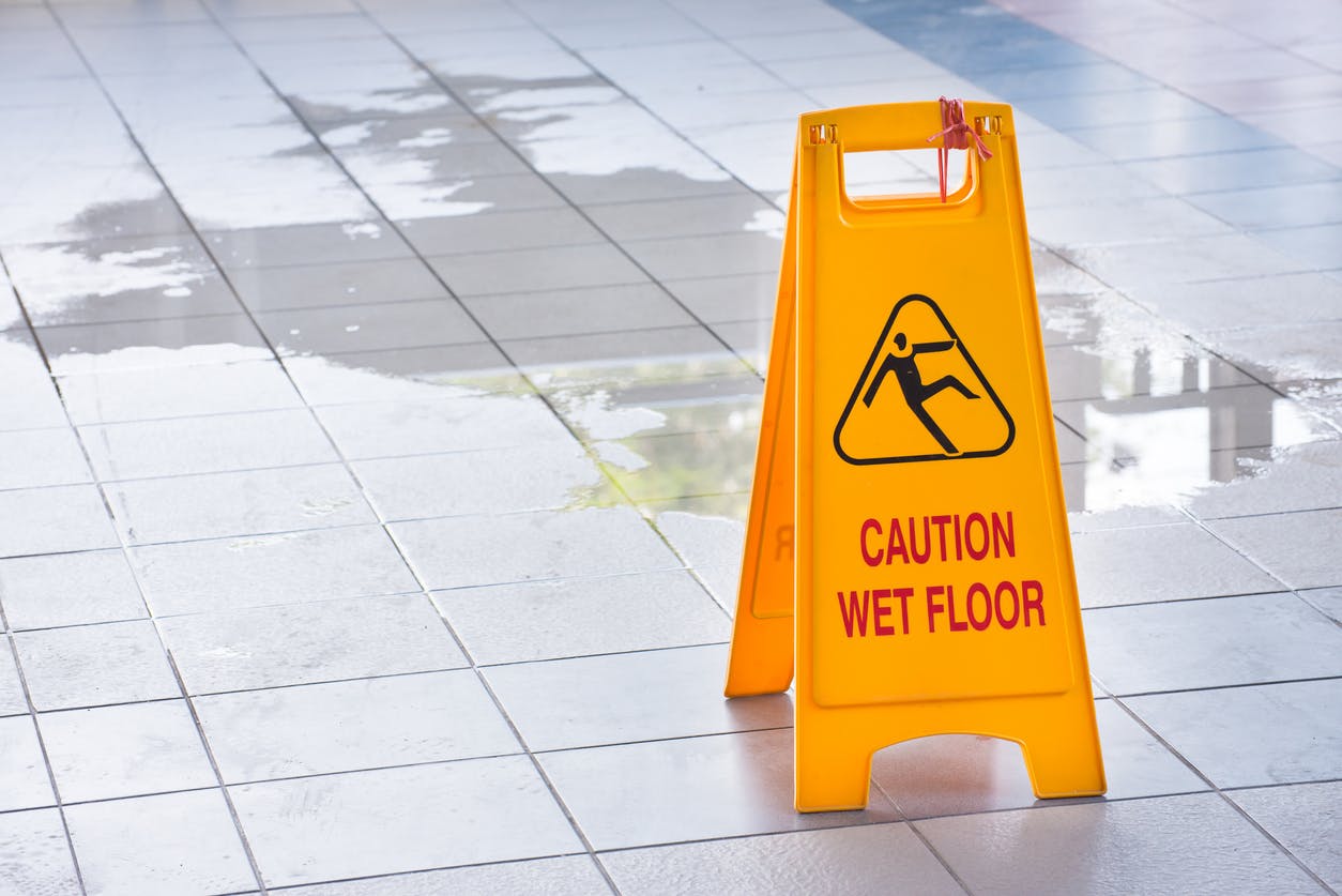 A caution wet floor sign
