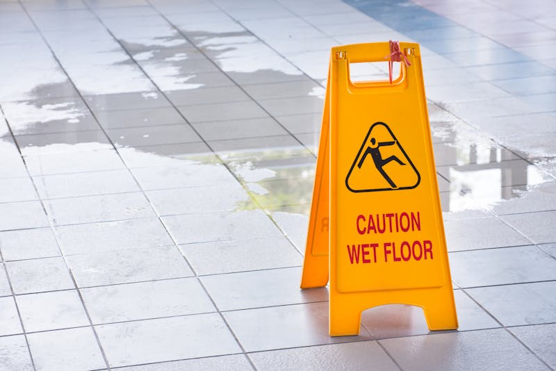 A caution wet floor sign