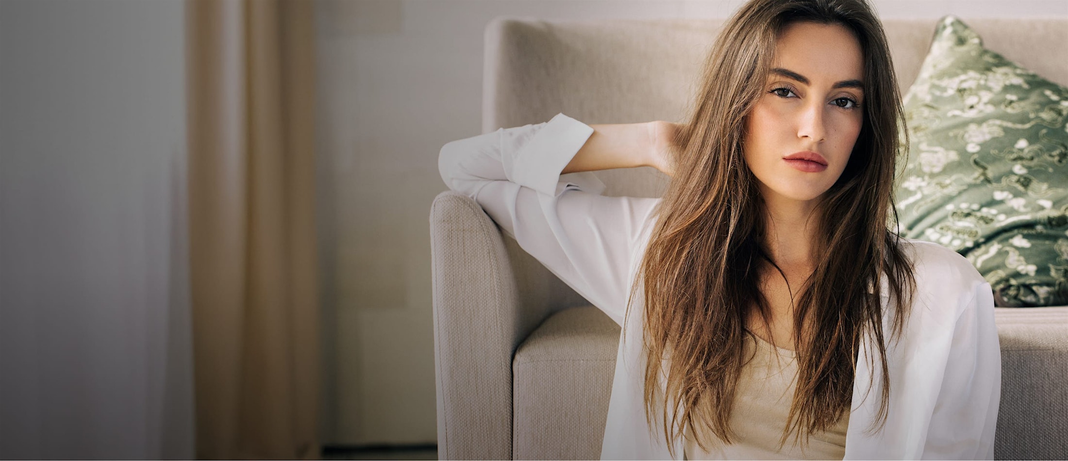 woman wearing a long sleeve white shirt