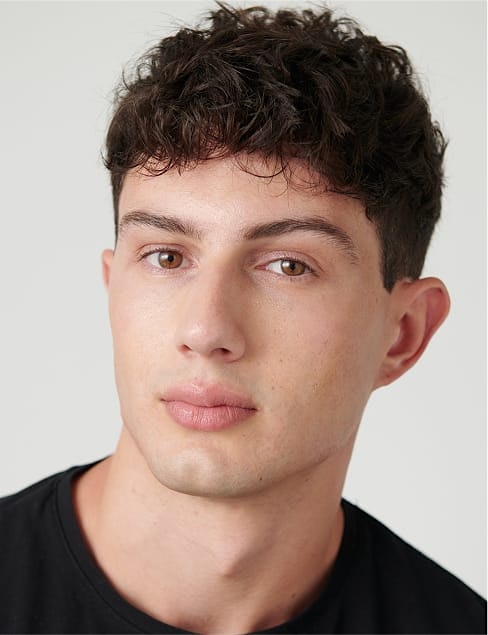 man with curly hair