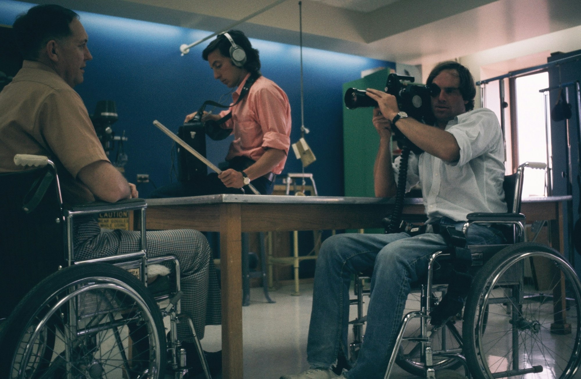 Barry Corbet films another wheelchair user in a studio