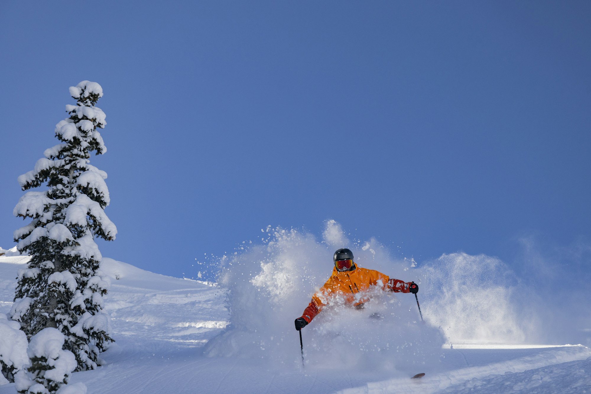 Skier David Berthiaume skis through deep snow