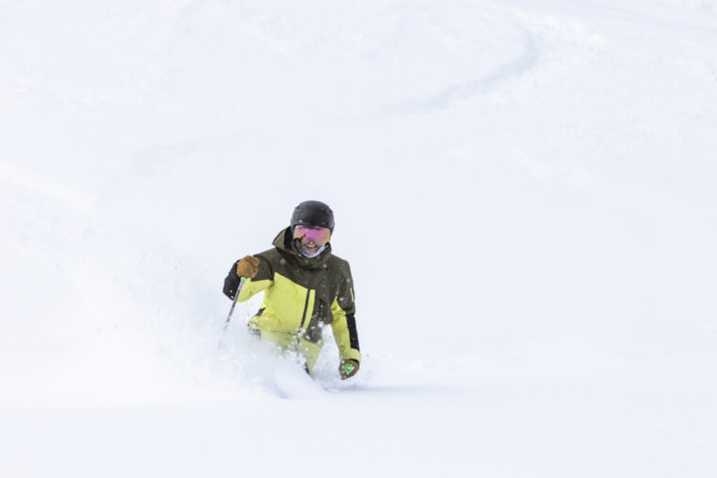 Skier Dave Amirault skis through deep snow