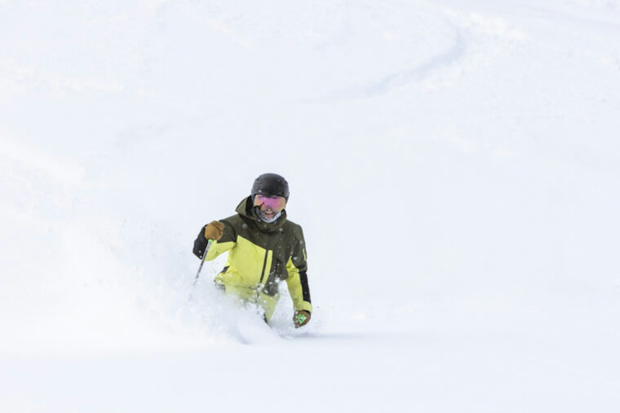 Skier Dave Amirault skis through deep snow