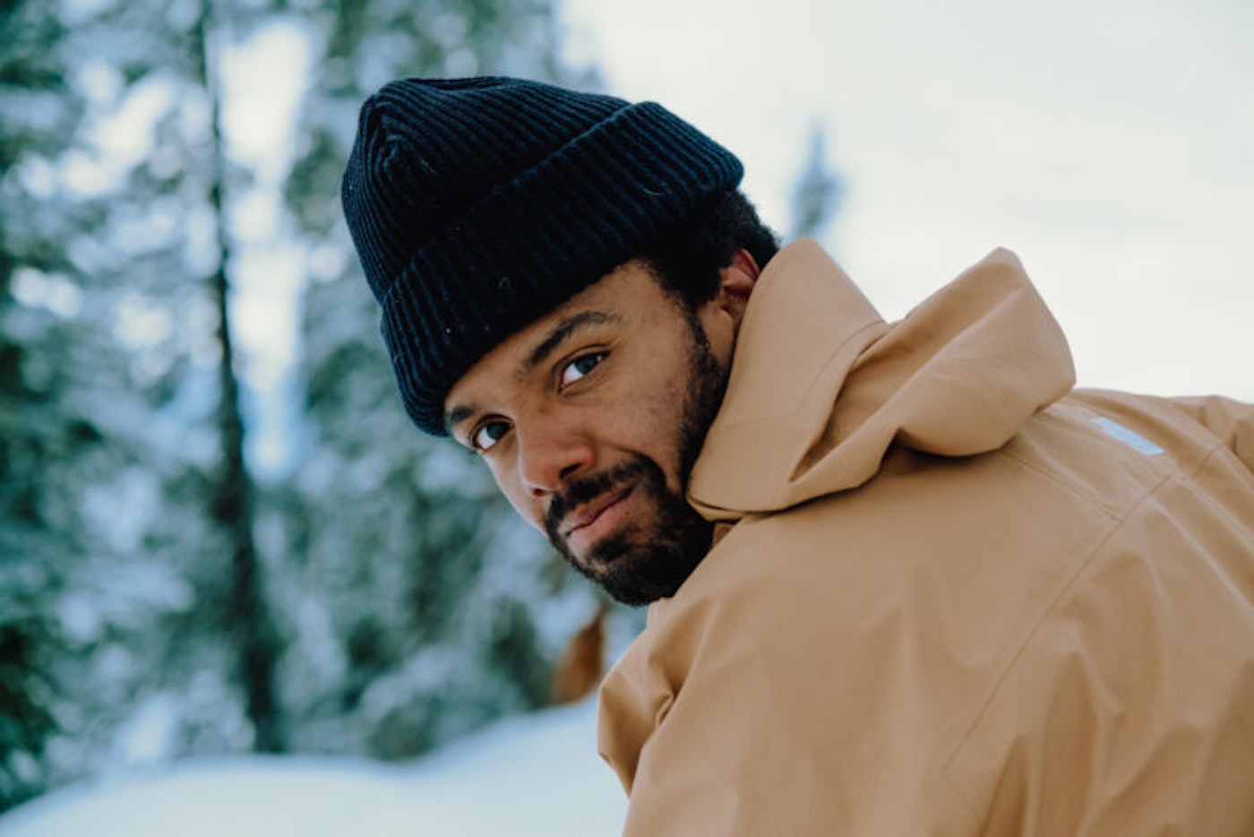 Dennis Ranalter poses for portrait looking at camera outside