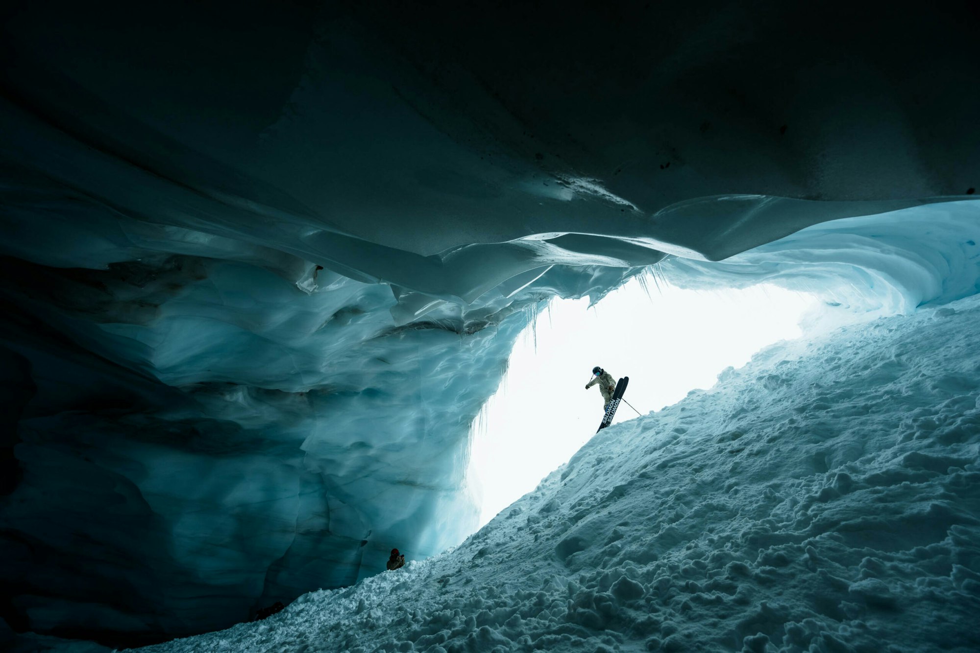 Skier Danny Garringer jumping into an ice tunnel