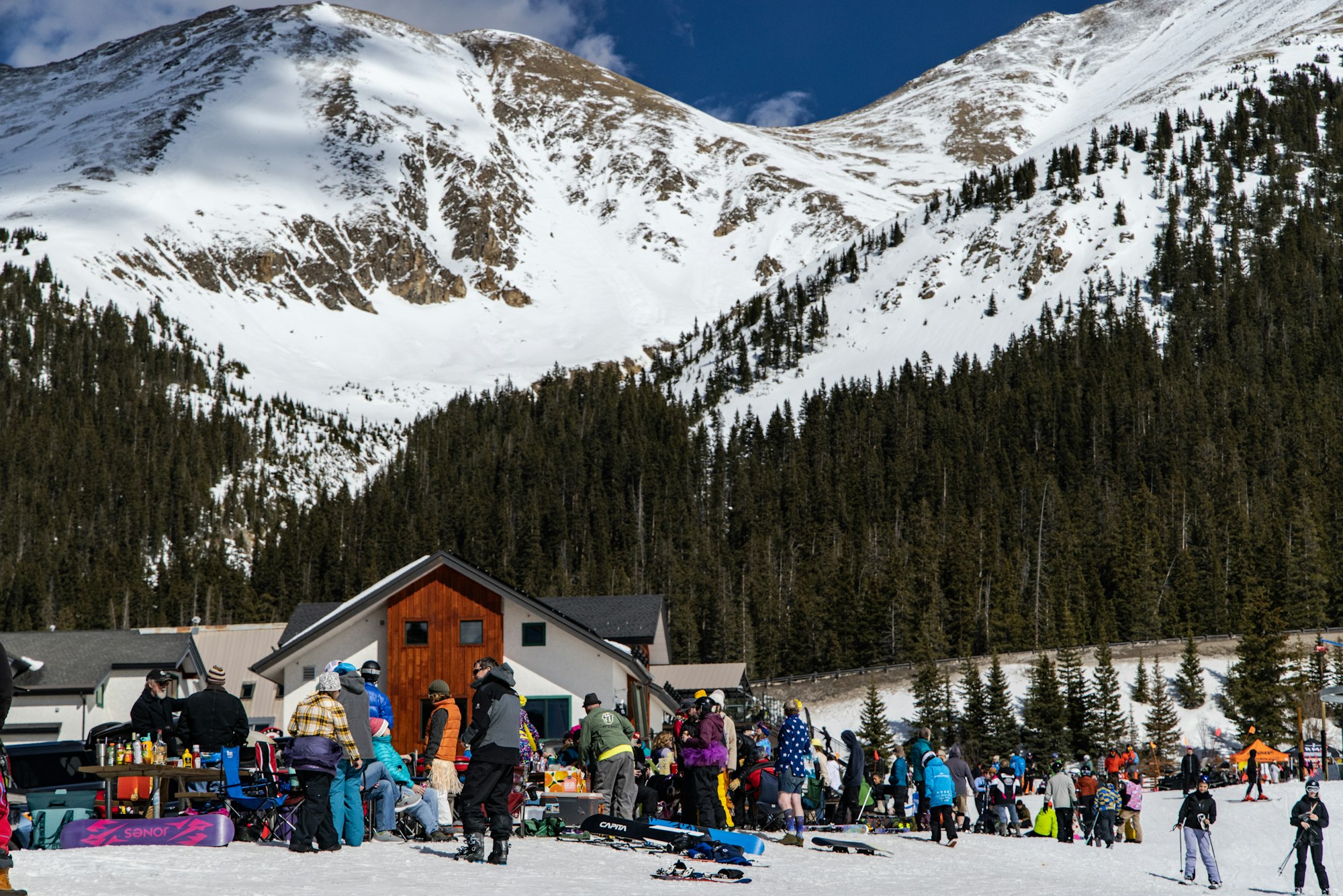 Skiers gather at the base lodge of Arapahoe Basin on