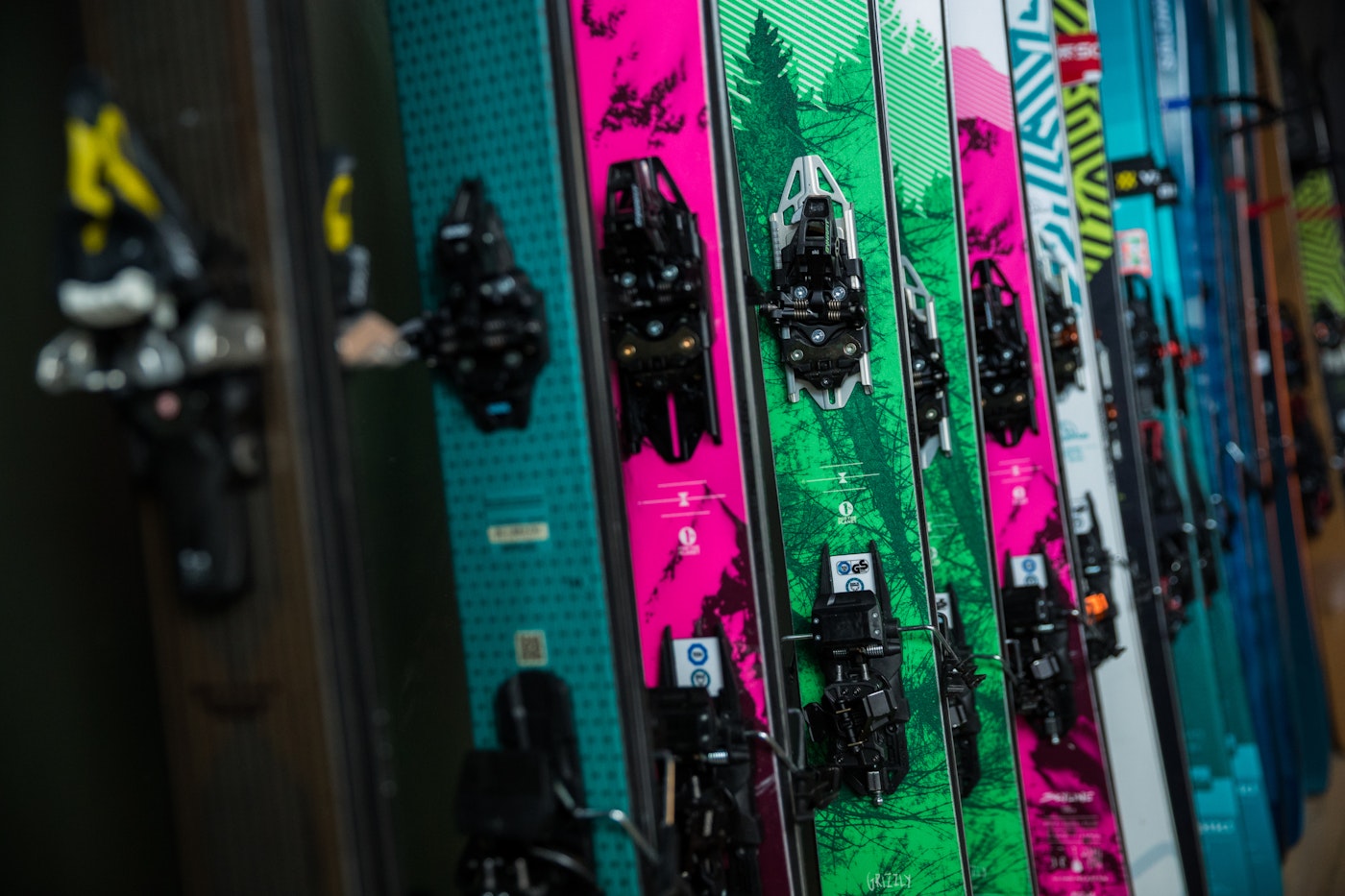 Skis lined up against a wall at the annual backcountry ski test