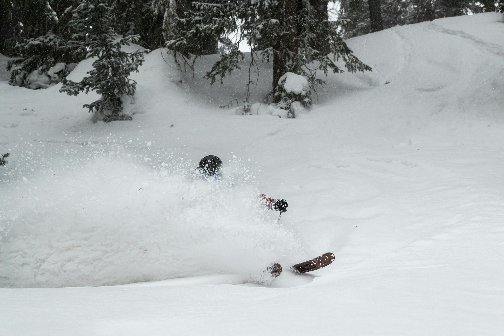 Ski tester Shane Furman turns through deep powder snow at Silverton Resort in Colorado