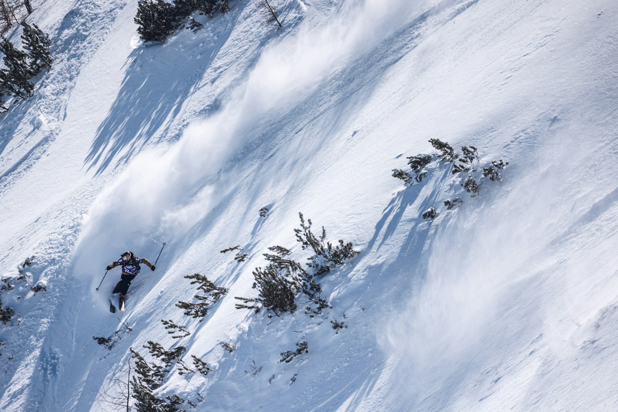 Freeride World Tour skier skiing down a snowy face