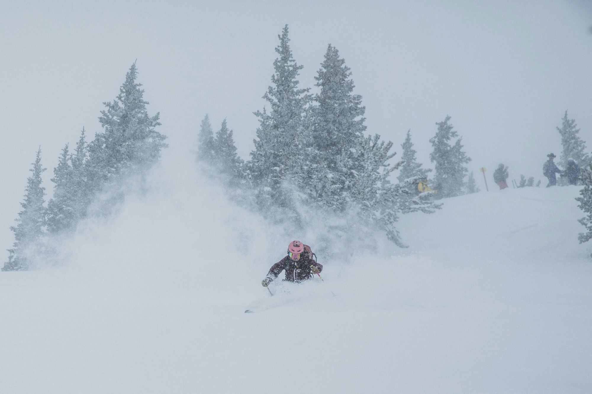 Skier skis in deep powder snow