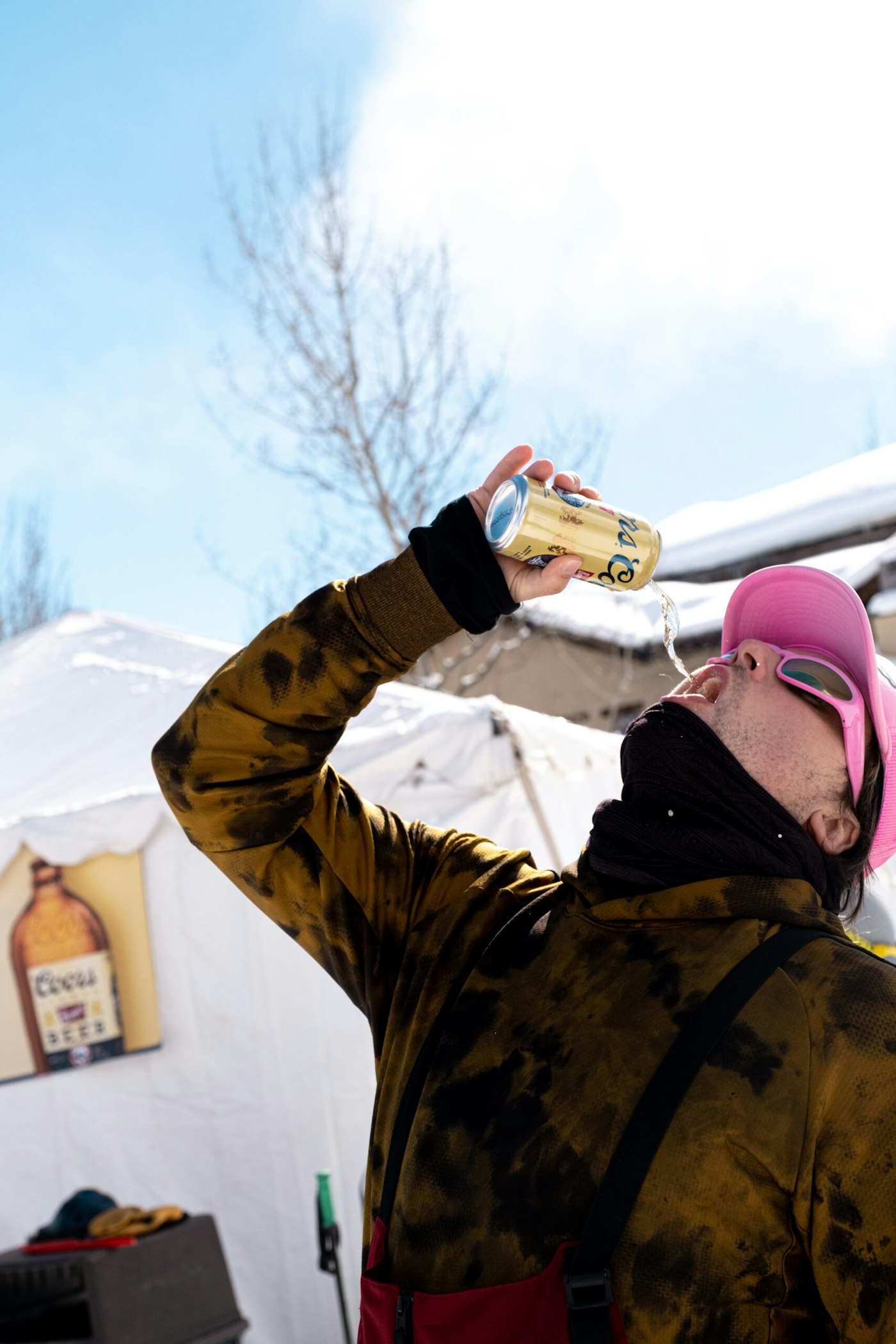 Man drinking Coors Banquet