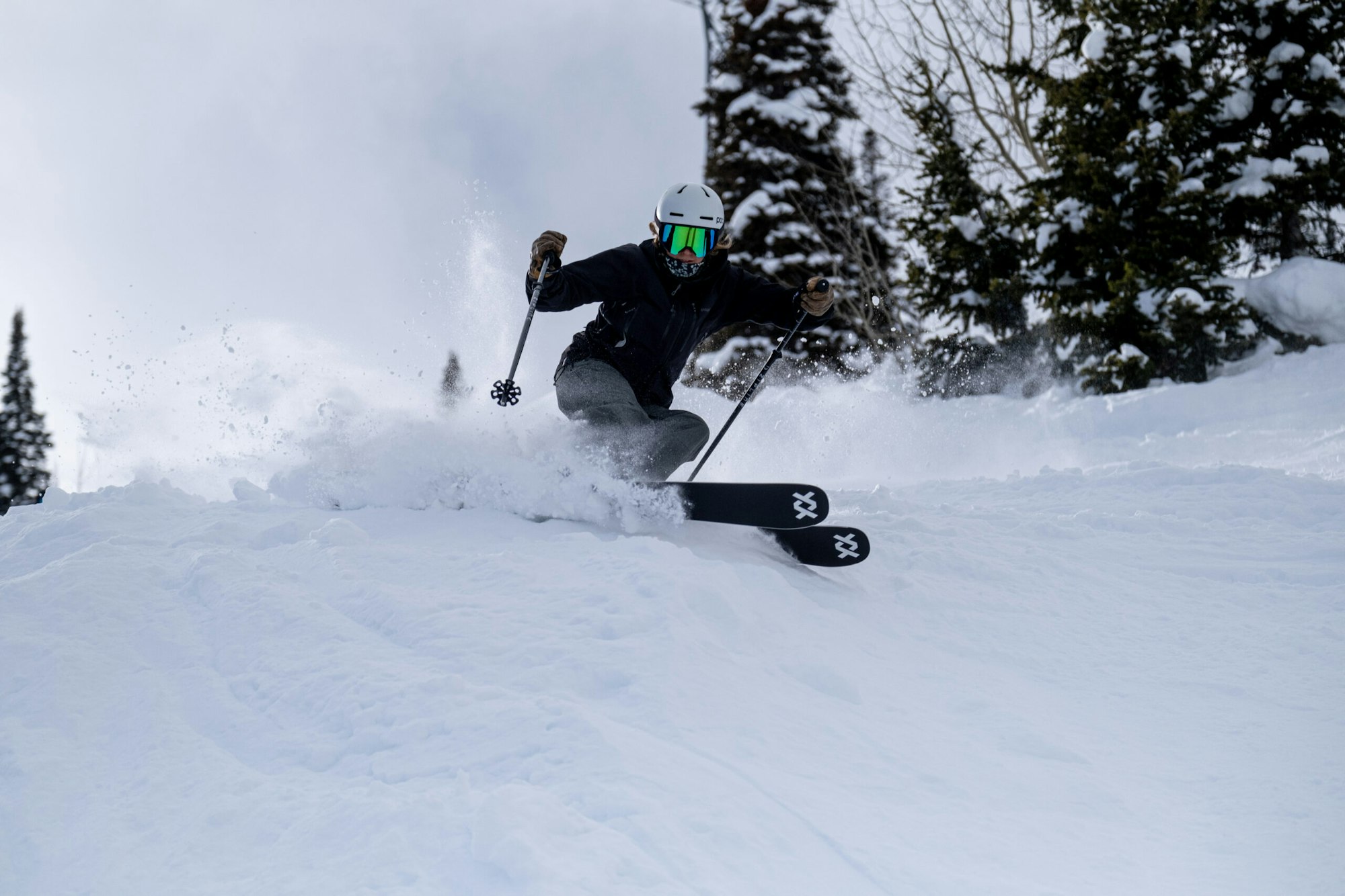 Skier turning in deep snow