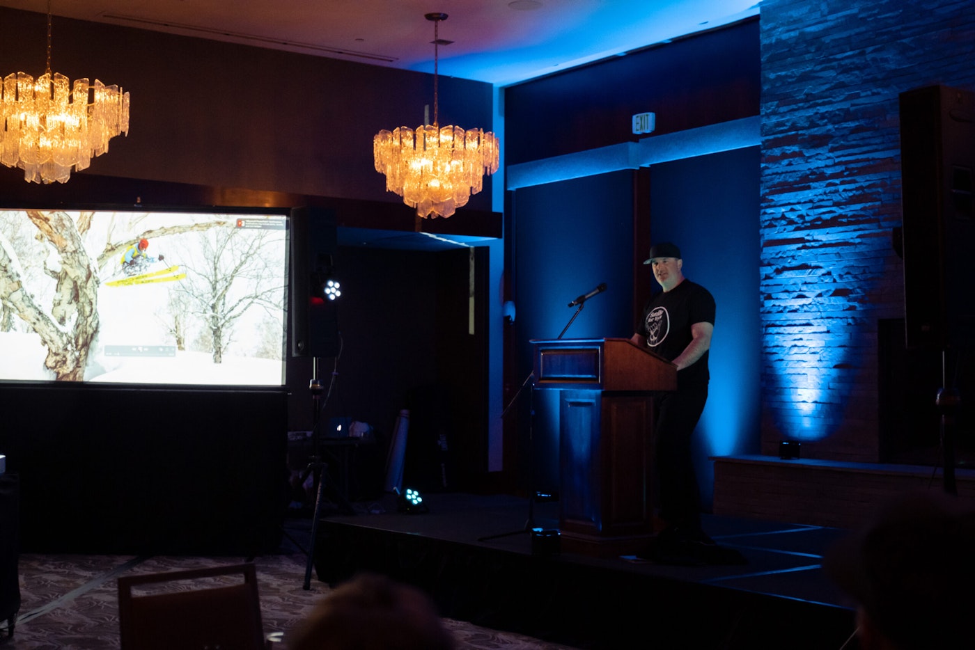 a man gives a speech from a podium