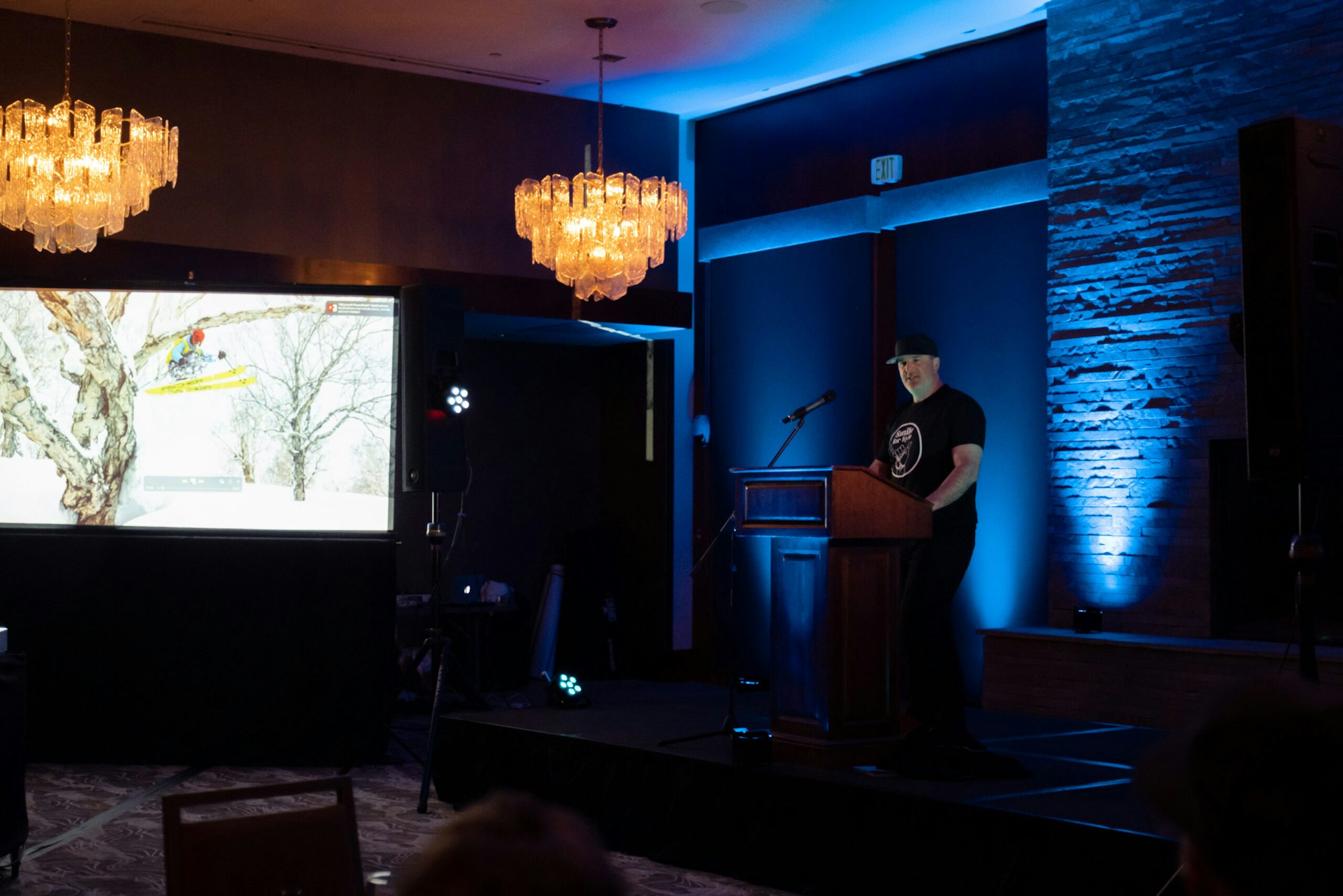 a man gives a speech from a podium
