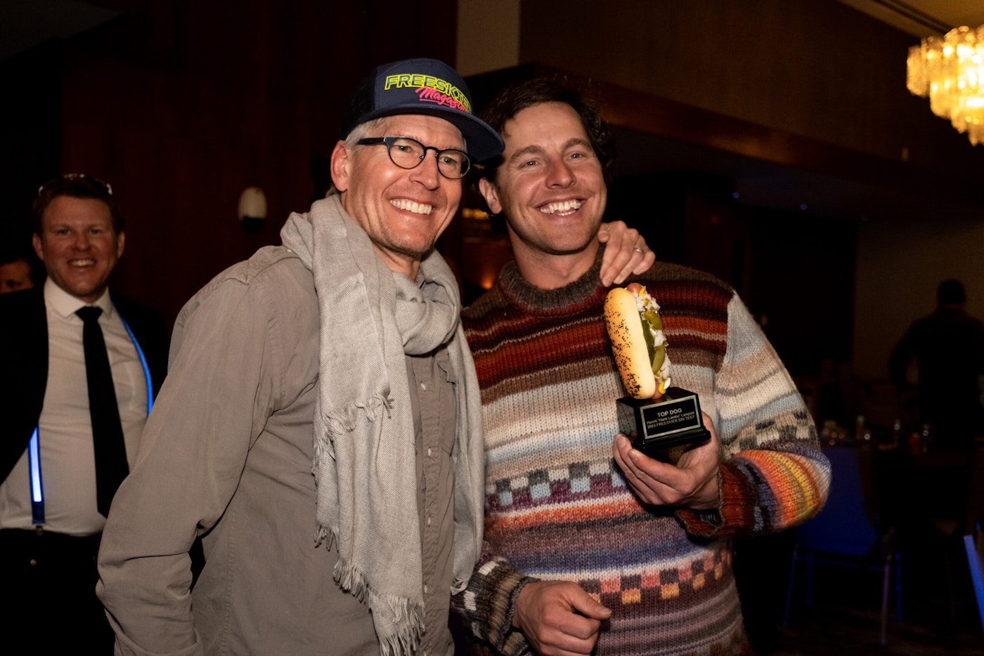 two men pose for a photo