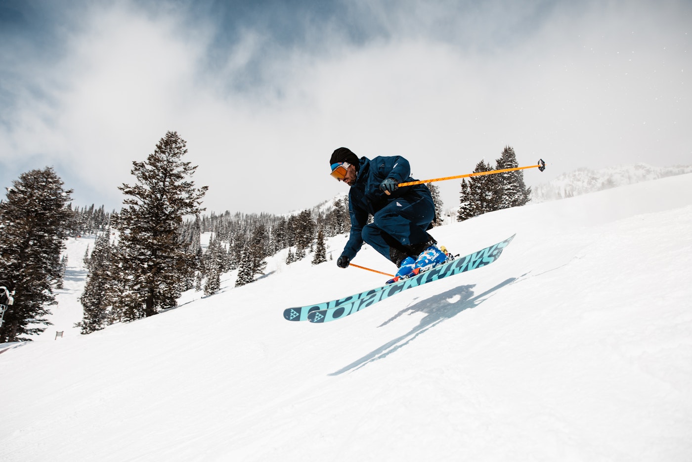 Skier jumps through the air on skis