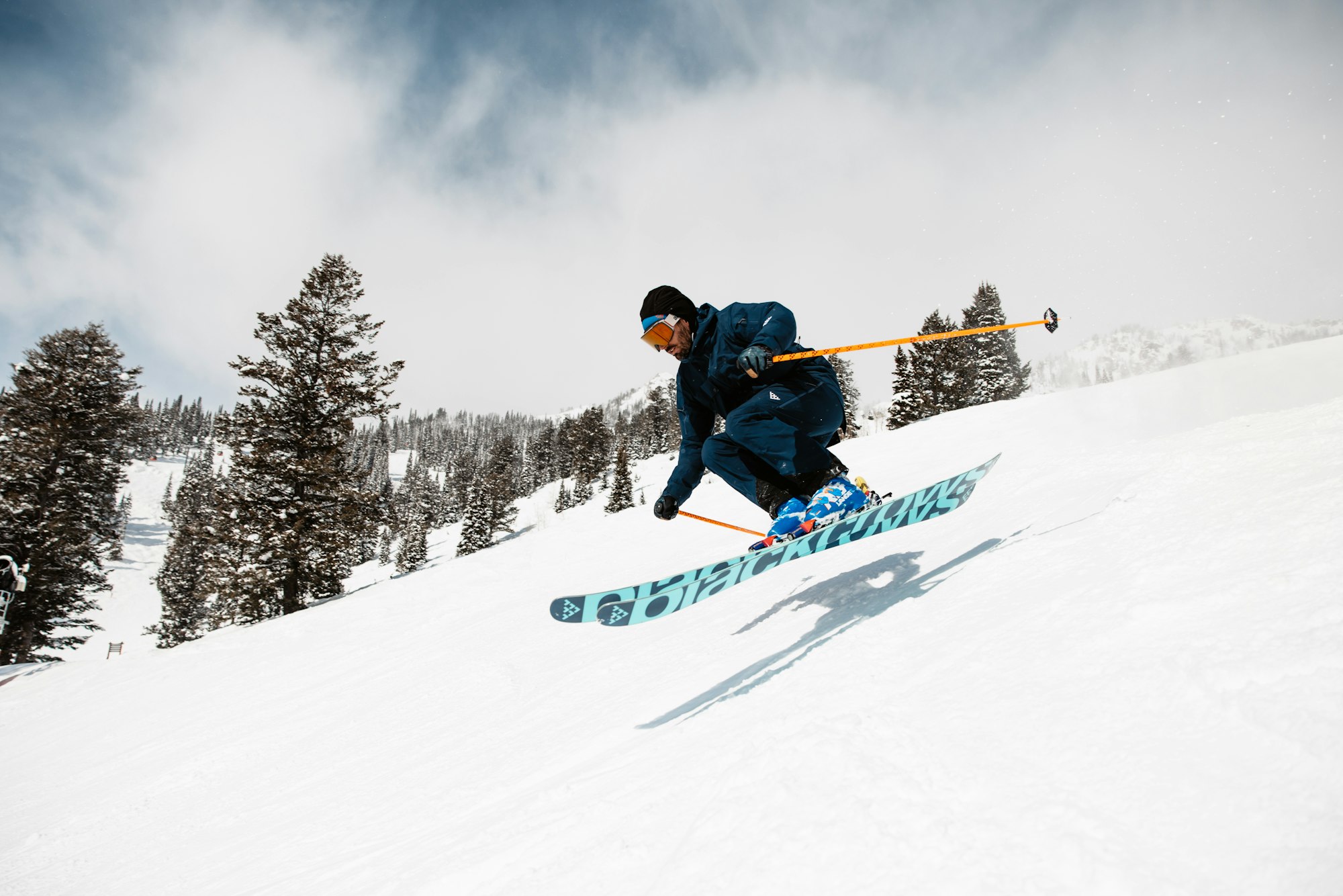 Skier jumps through the air on skis