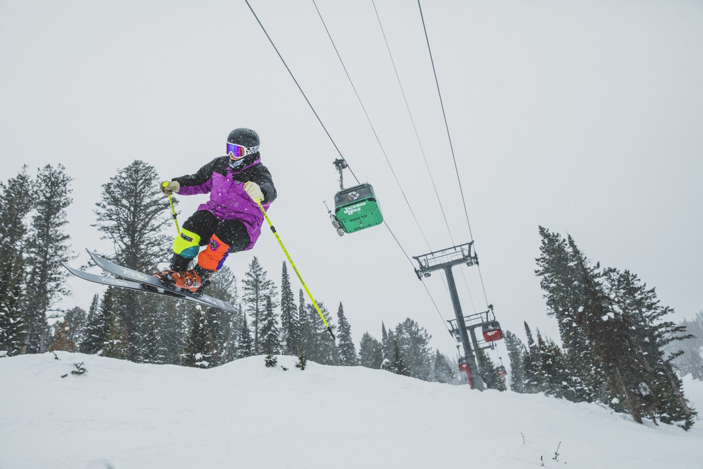 Skier catches air under the Jackson Hole gondola