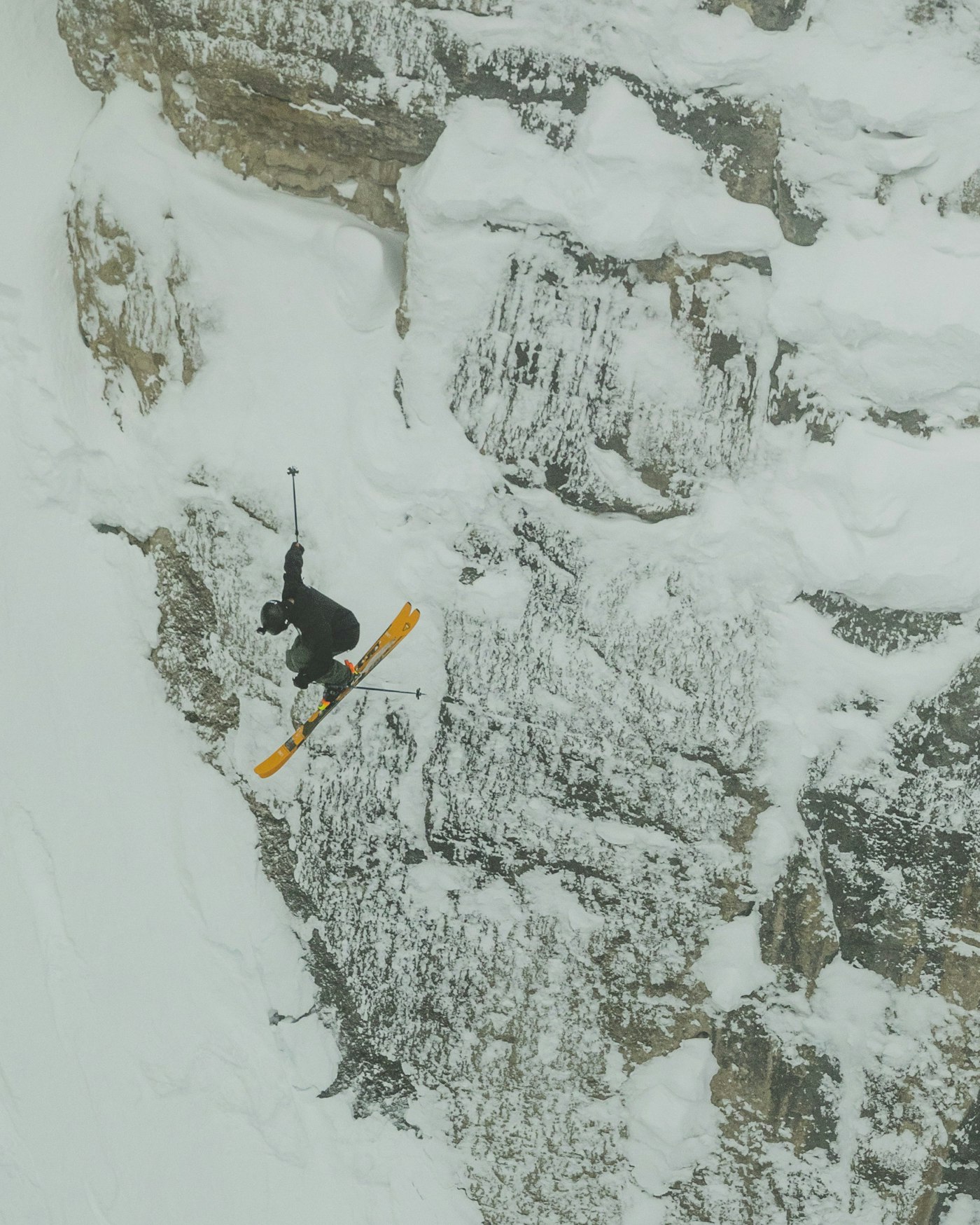 Skier Ben Richards does a 360 into Corbet's Couloir in Jackson Hole, Wyoming.