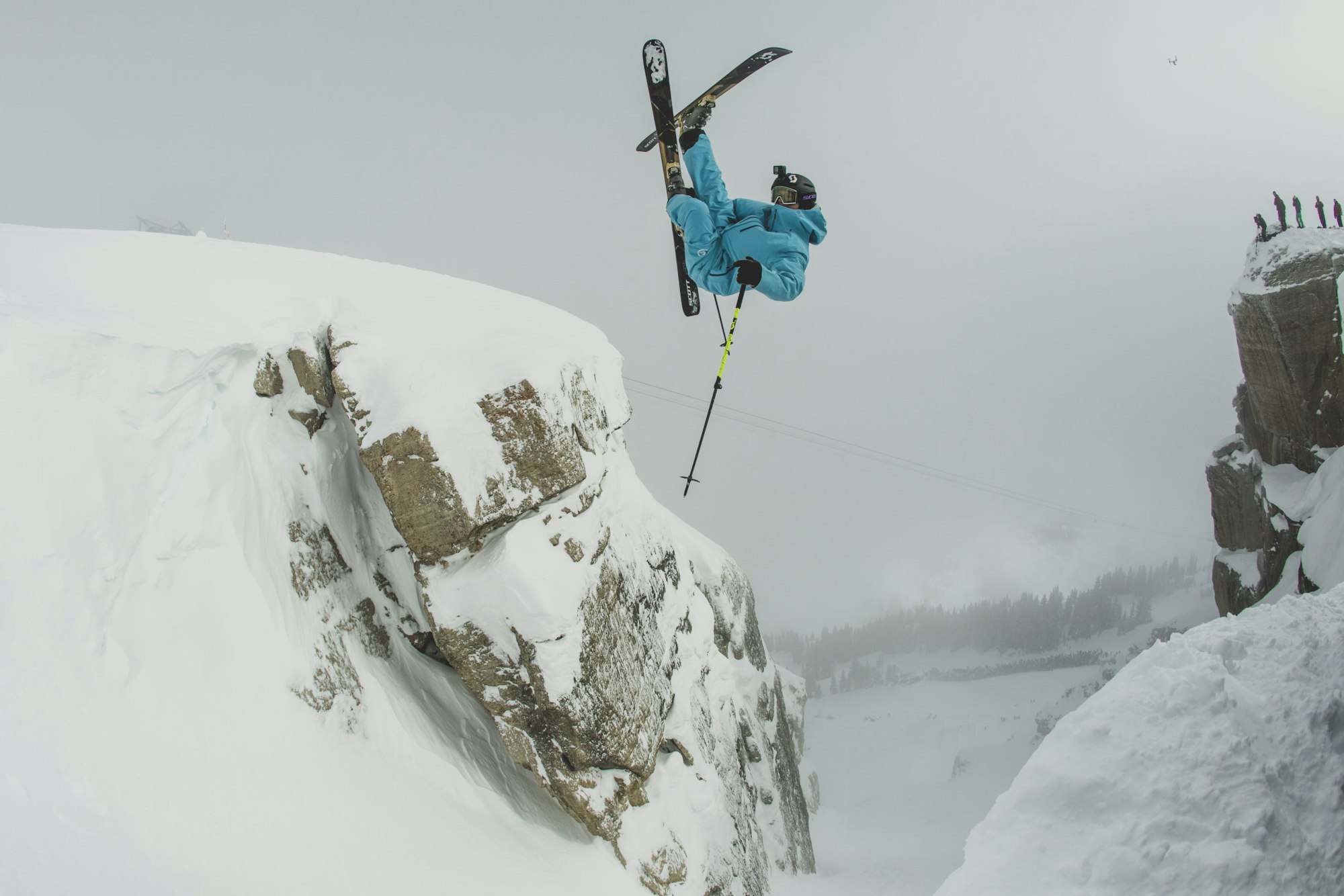 Skier Parkin Costain does a flat 3 Japan into Corbet's Couloir in Jackson, Wyoming