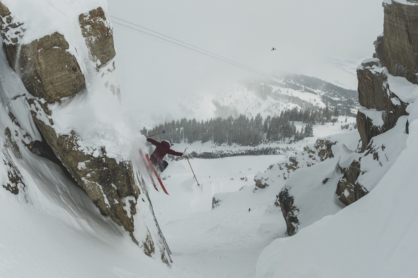 Skier Piper Kunst dropping into the West Wall of Corbet's Couloir in Jackson Hole, Wyoming.