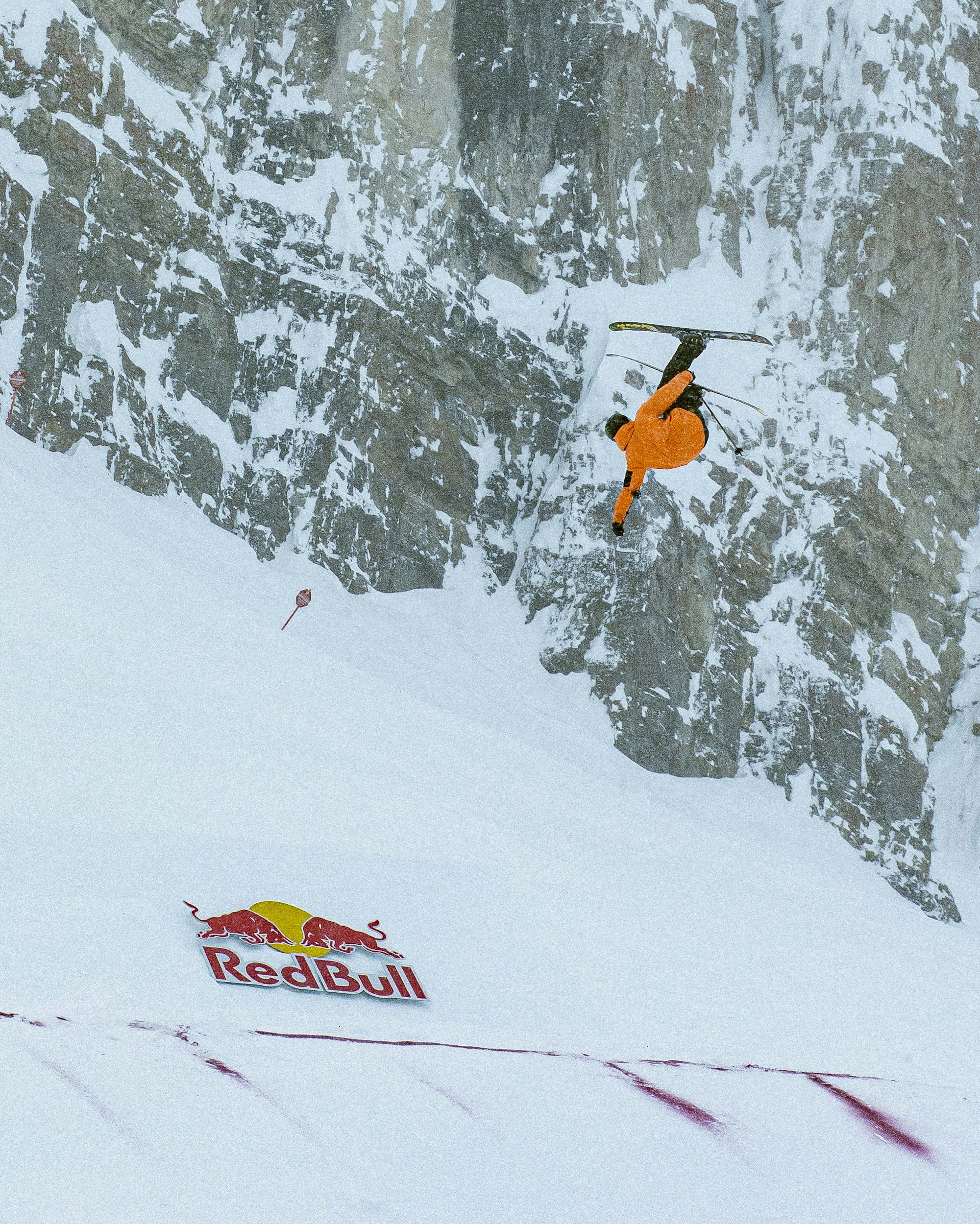 Skier Colby Stevenson doing a flat 3 off the bottom jump of the Kings and Queens of Corbet's Couloir course.
