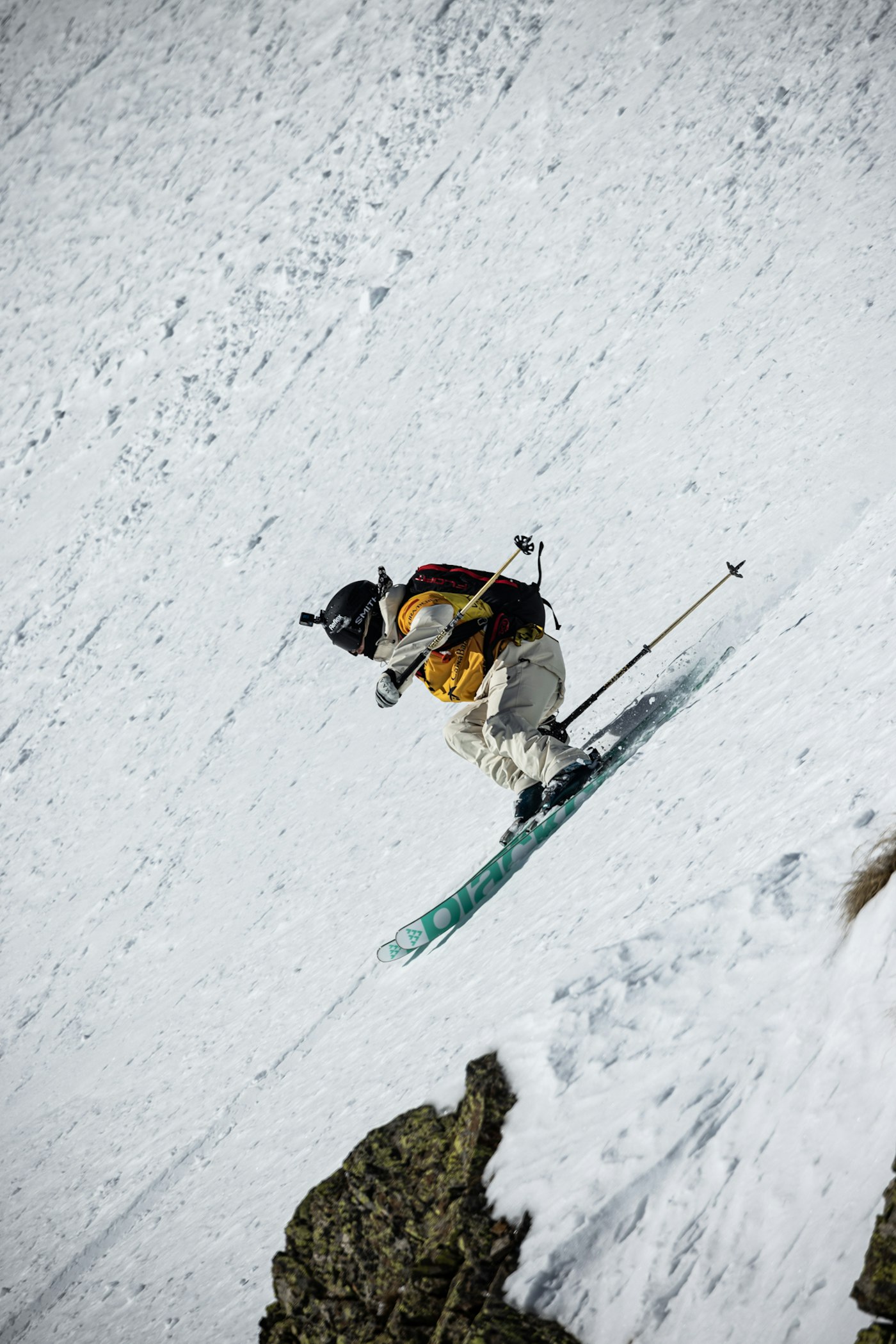 Freeride World Tour skier turning down a steep slope