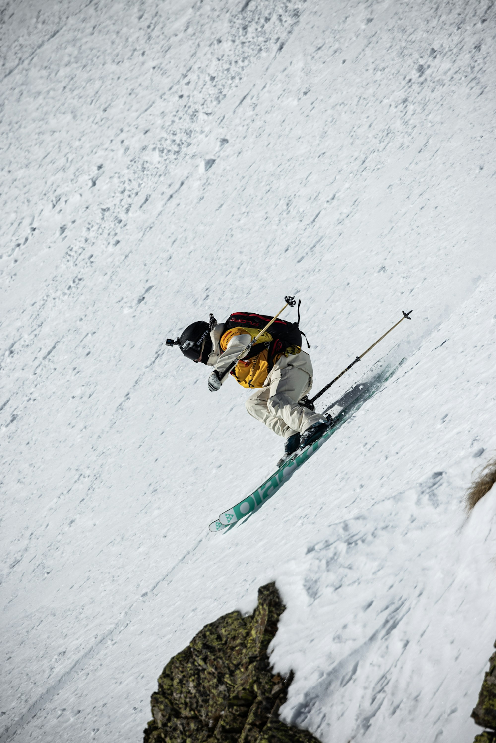 Freeride World Tour skier turning down a steep slope