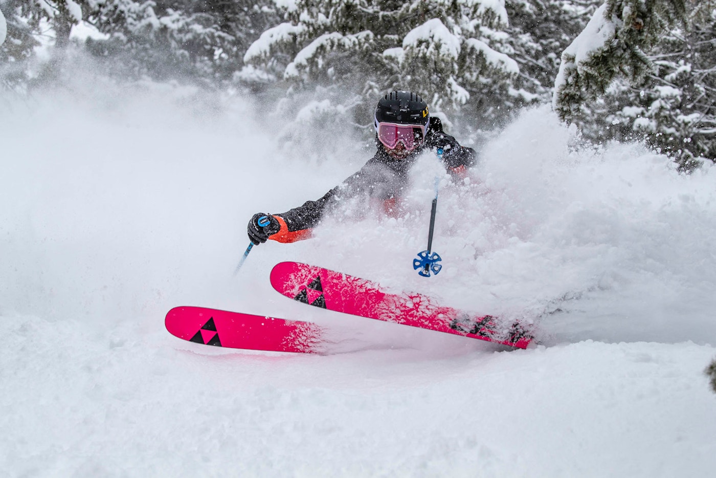 FREESKIER Ski Test skier turning through deep snow