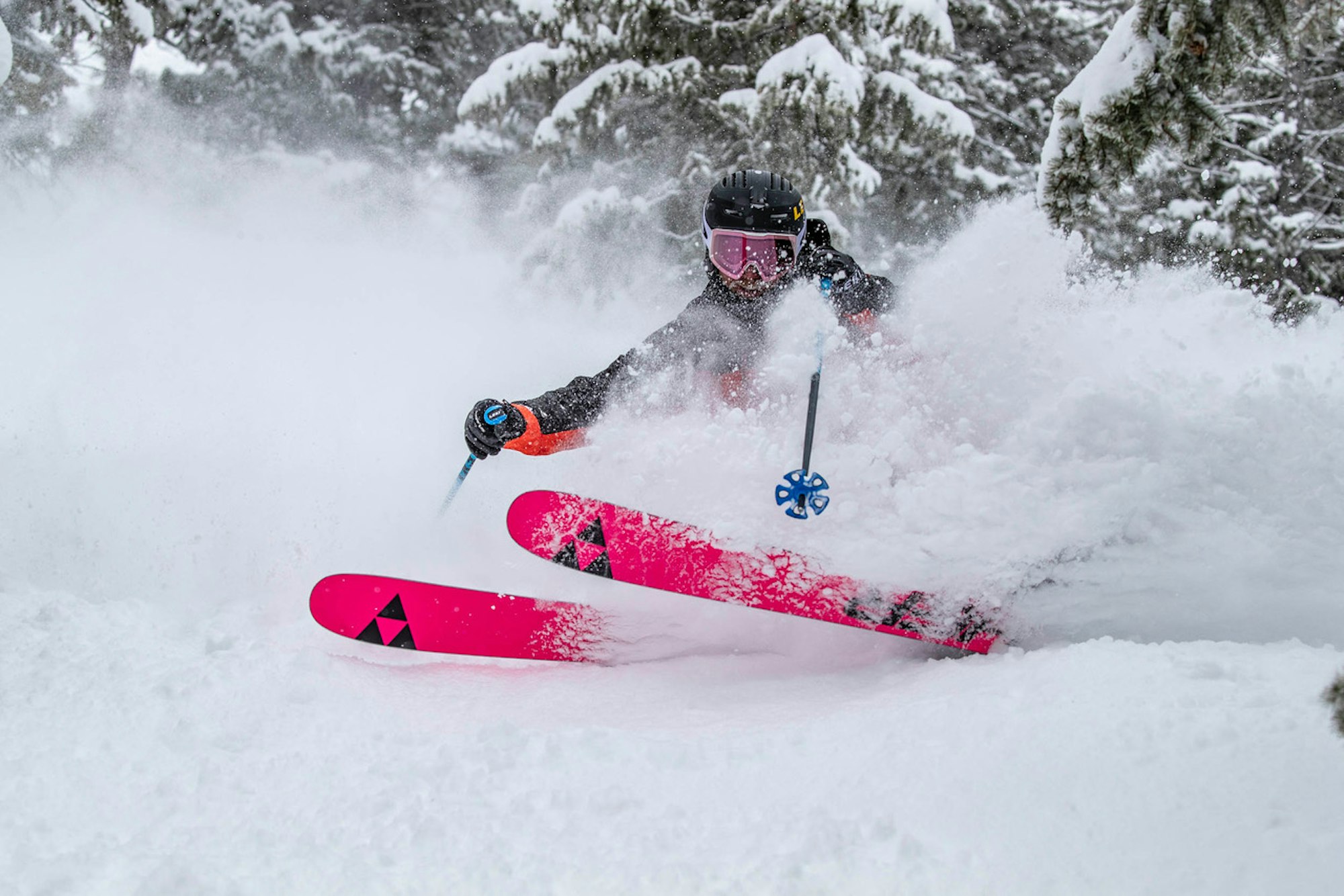 FREESKIER Ski Test skier turning through deep snow