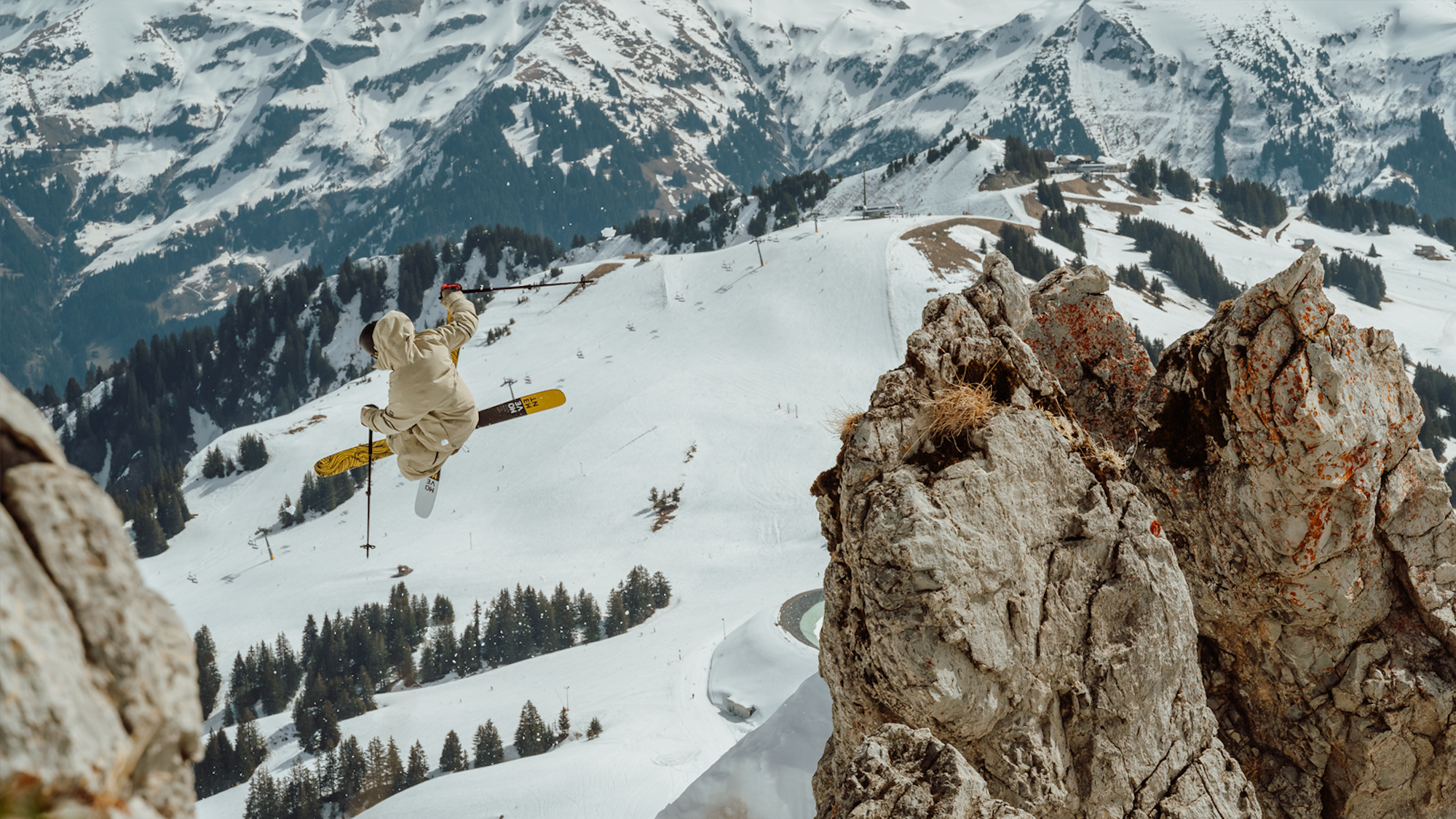 Skier Laurent De Martin jumping into deep snow at Dents du Mini, CHE