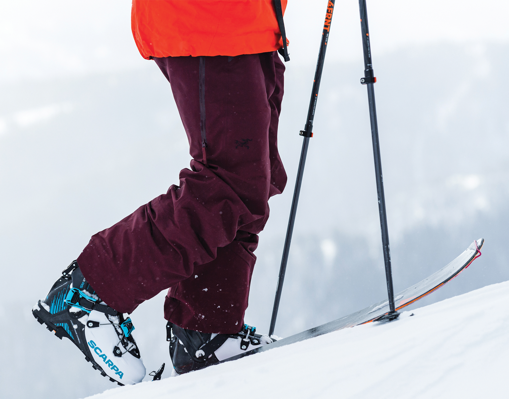 Skier wearing Scarpa touring ski boots