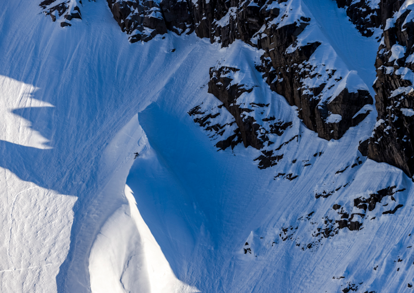 Skier in Alaska on a steep slope