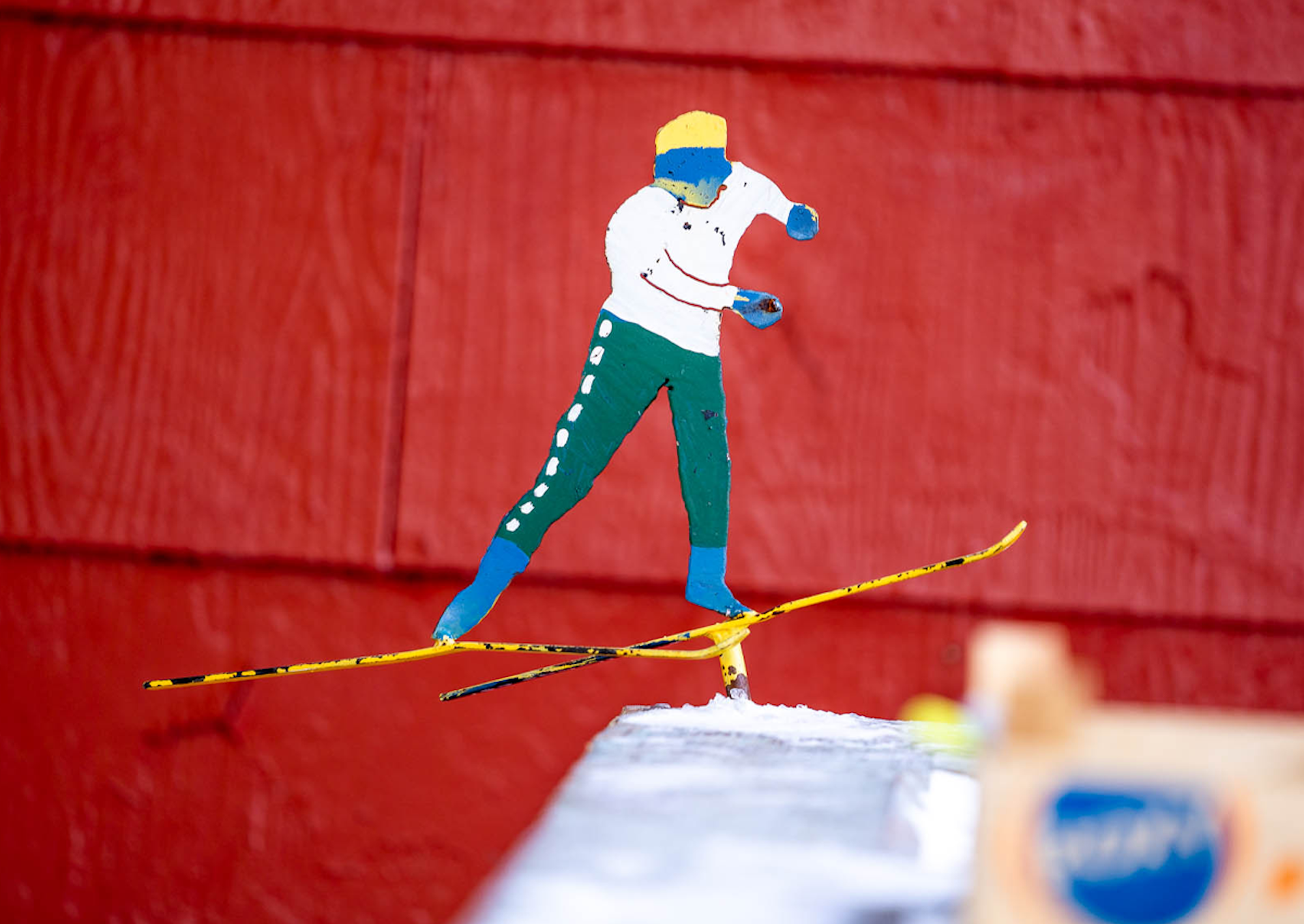 Decorative cross country skier metal sculpture