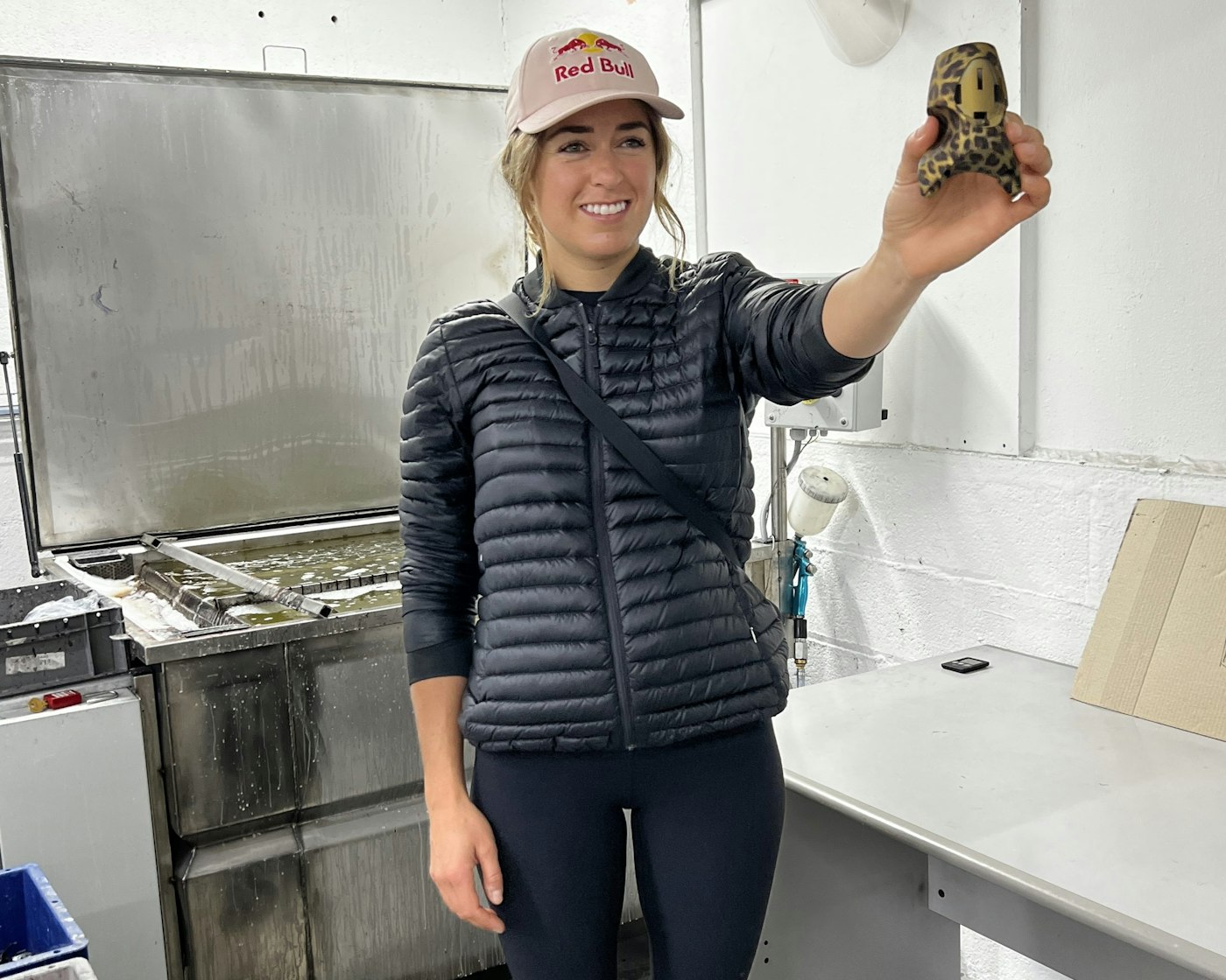 Tatum Monod holding up a cheetah look pivot toe