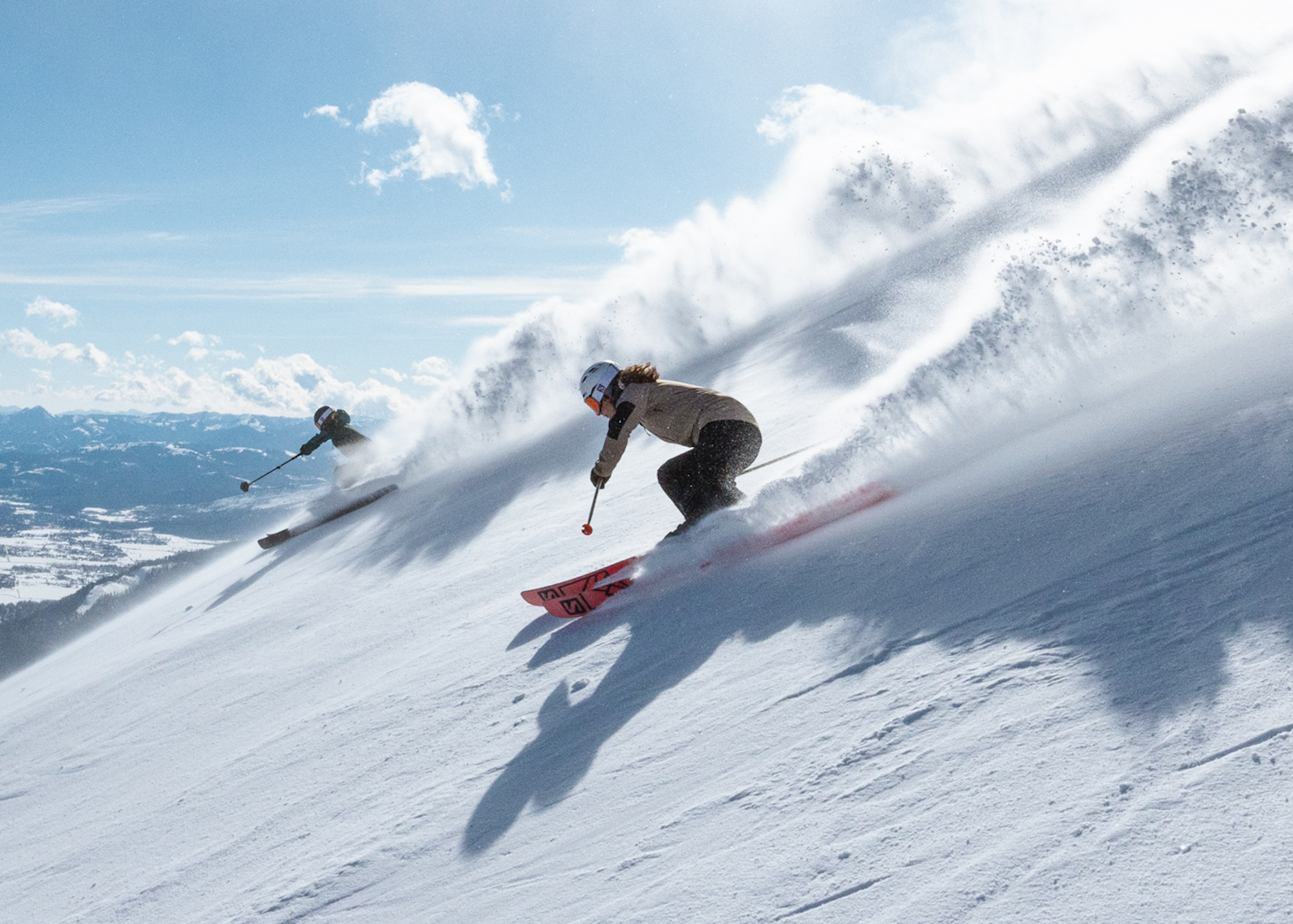 Rose Caston and Kristie Ryan skiing