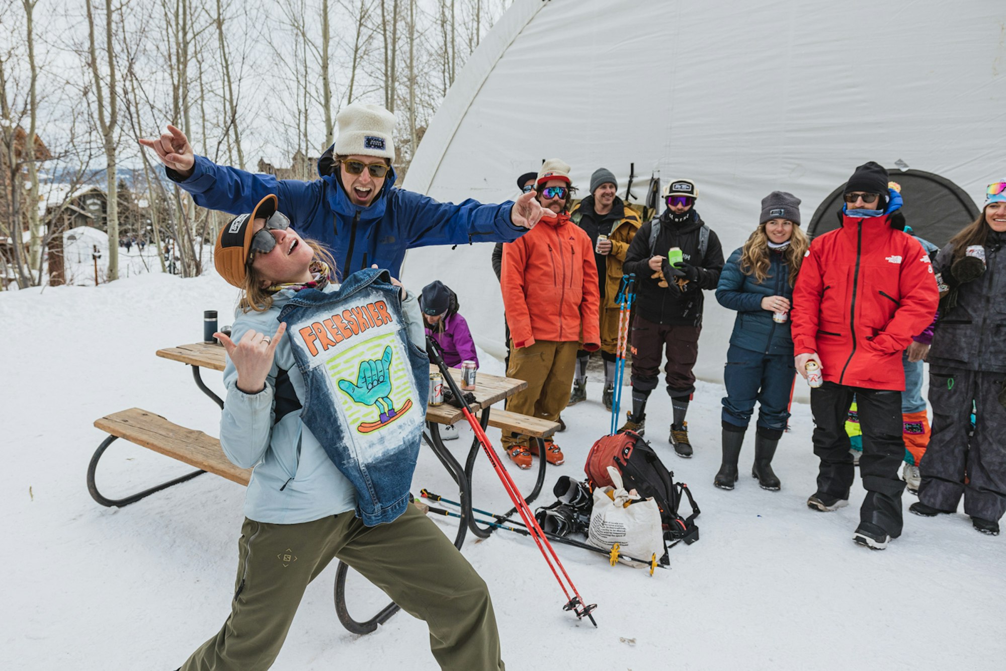 woman holding freeskier shirt