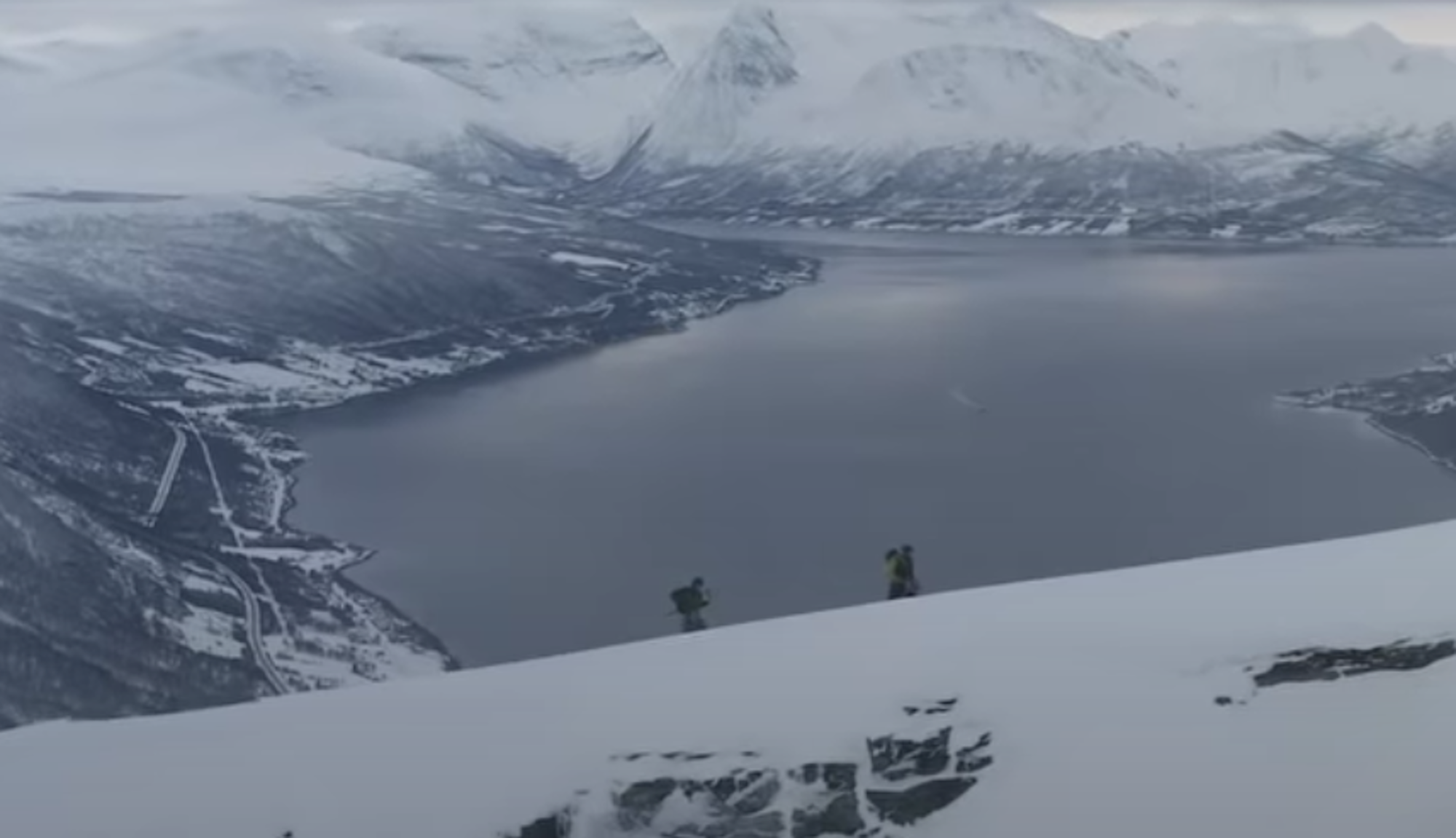 Skiing the Blue Mountain chute in Trømso