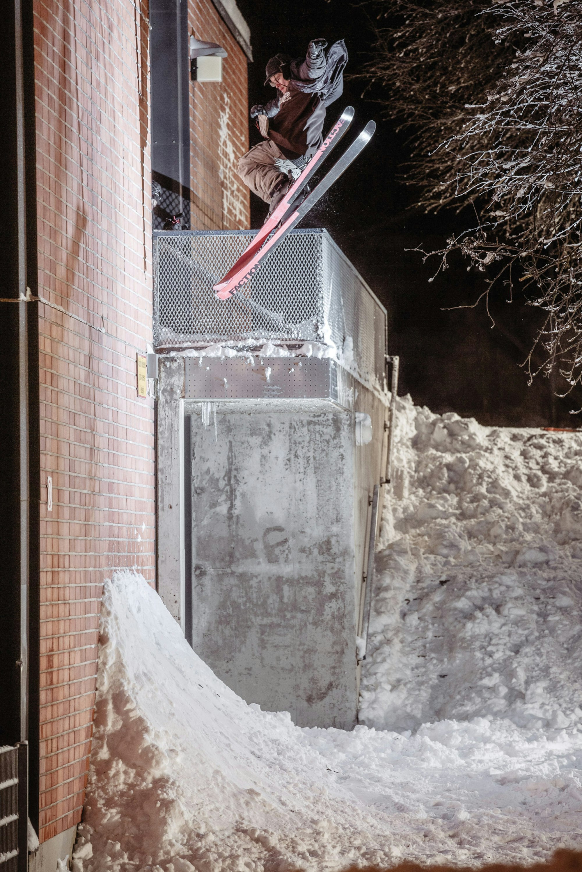 Skier Antti Ollila sliding off a balcony rail in Helsinki, FIN