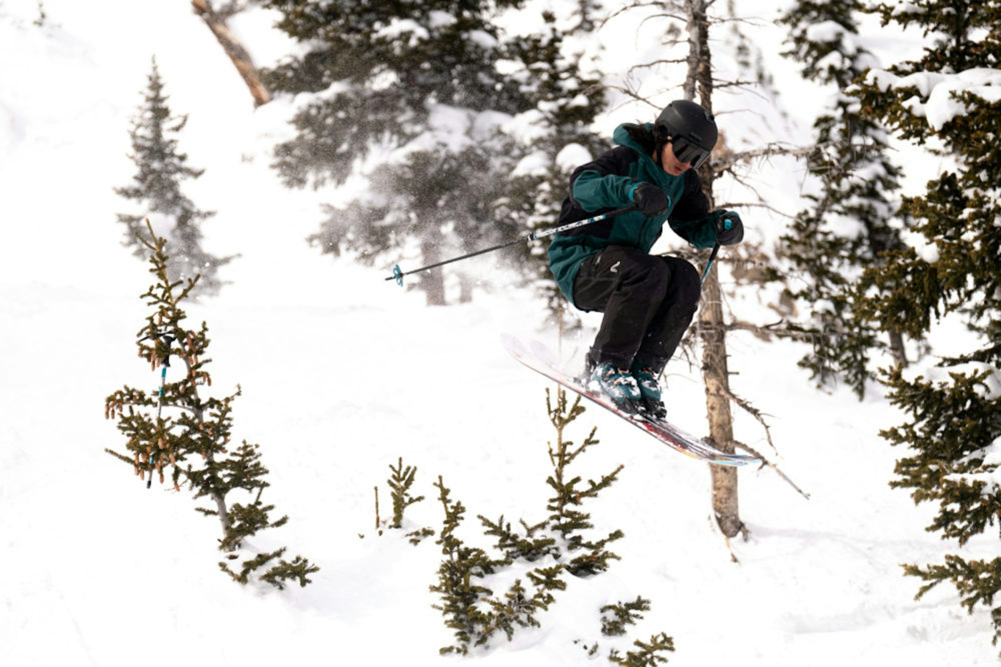 Skier catches air in deep snow