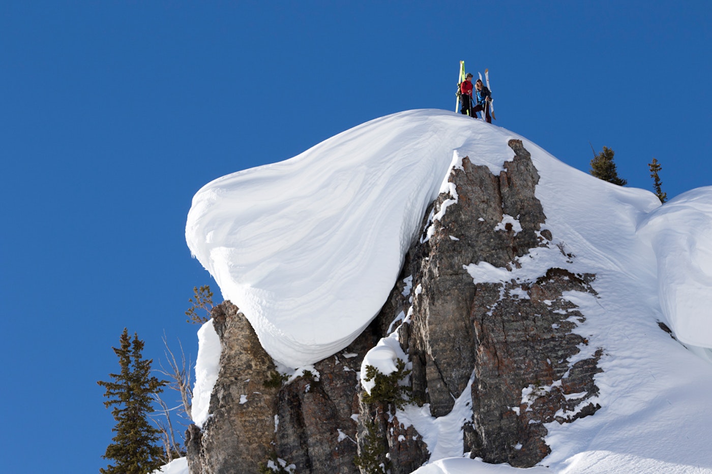 This Is Home athletes Johnny Collinson and Sam Anthamatten scope their lines in the Wasatch Range.