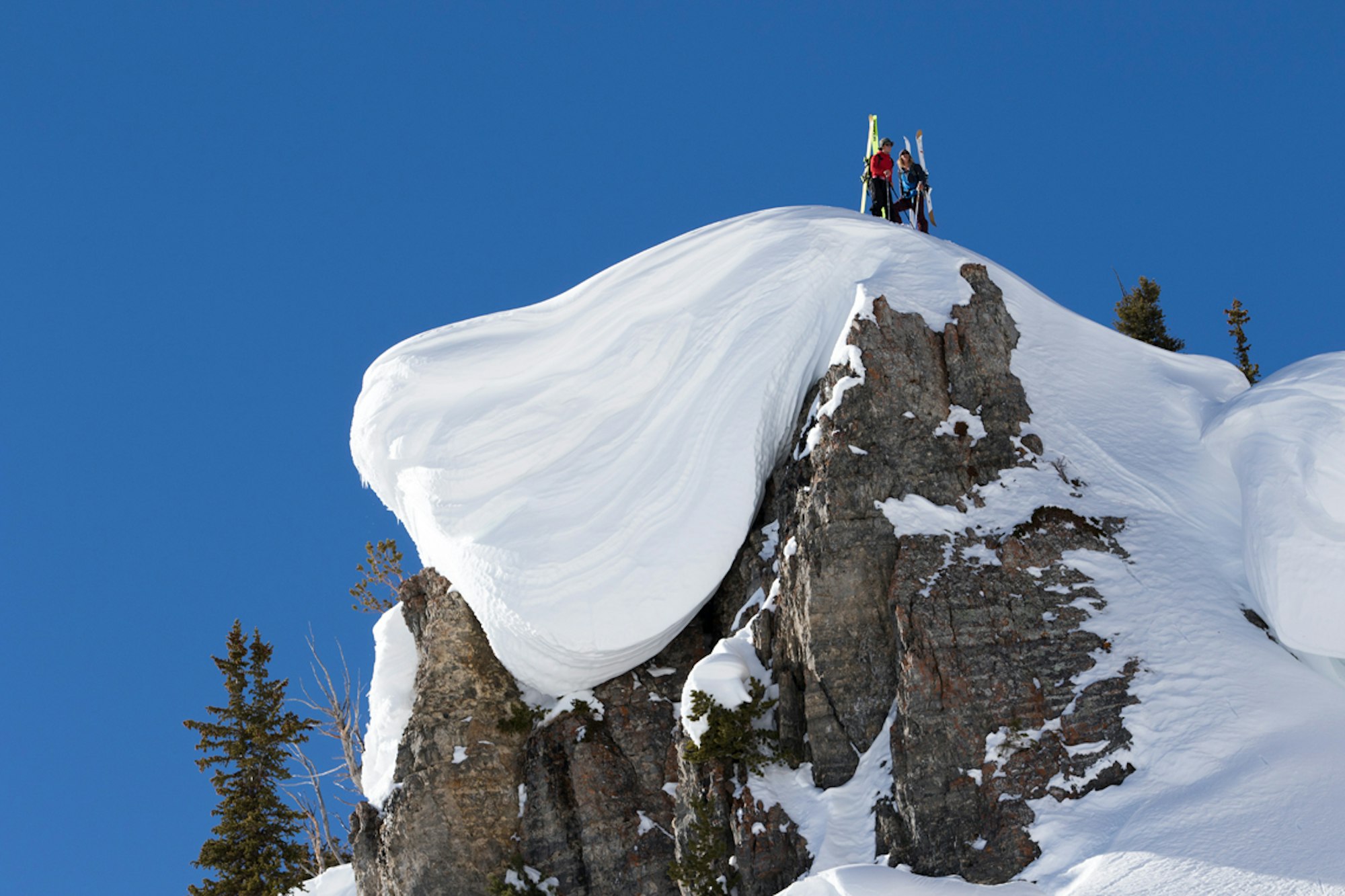 This Is Home athletes Johnny Collinson and Sam Anthamatten scope their lines in the Wasatch Range.