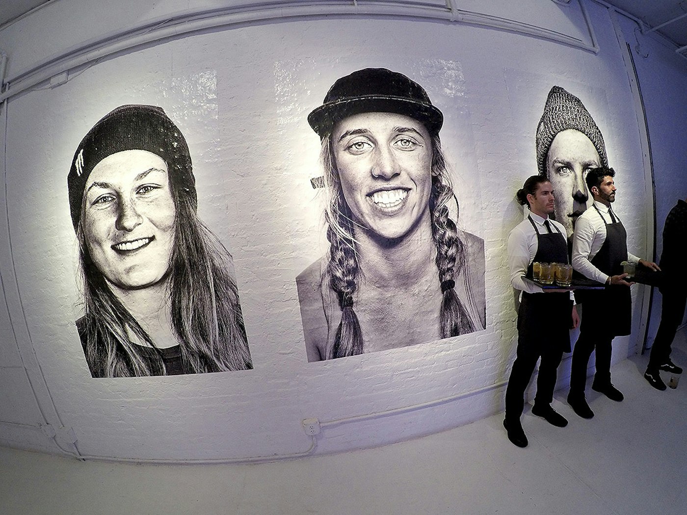 The North Face treated the event like an upscale gallery party, complete with hors d'oeuvres, blown-up athlete murals and, of course, cocktails.