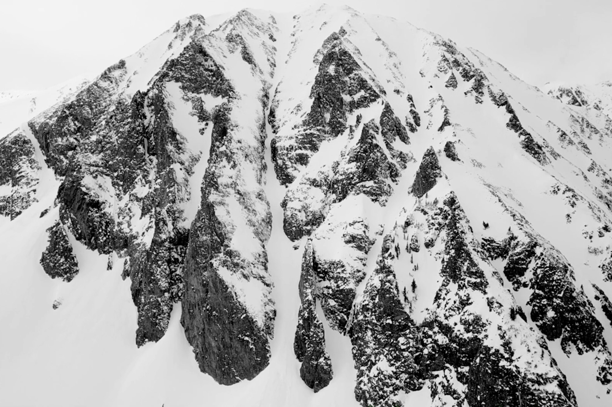 This black and white drone footage magnificently captures Colorado backcountry skiing