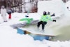 Total maniac performs double-backflip pond skim maneuver with ease