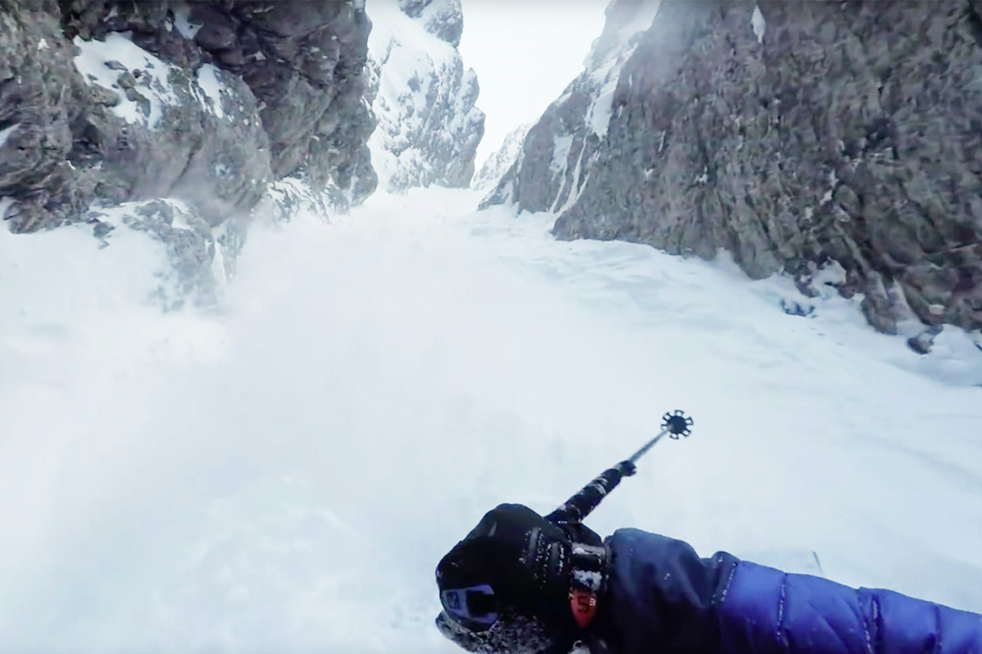 Ballsy French skier squeezes down mega-skinny couloir like a boss
