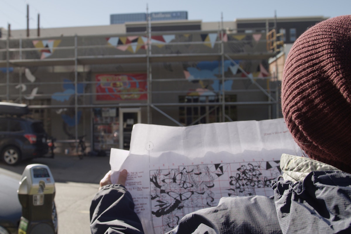 Video and photos: See the Faction x evo collab mural on evo's new store in Denver