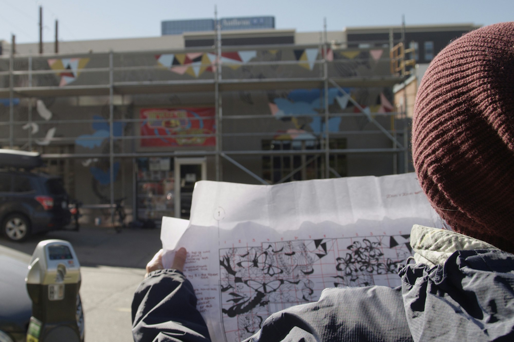 Video and photos: See the Faction x evo collab mural on evo's new store in Denver