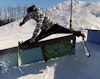 Skier doesn't have the speed on gap-to-rail; it doesn't end well